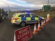 Police have closed off the road following the crash