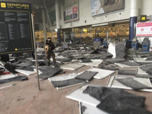 The carnage left behind following the explosions at the airport