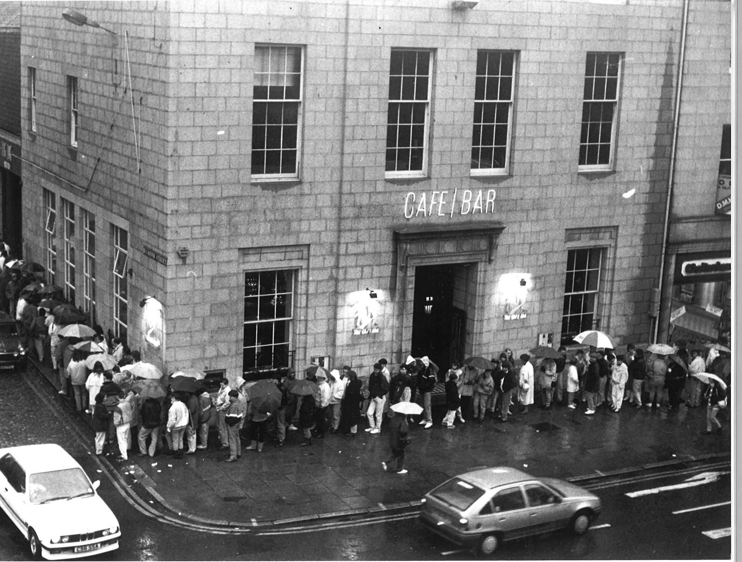 DEC 1989. Fans queue at One Up in Diamond Street at 5am to bag tickets