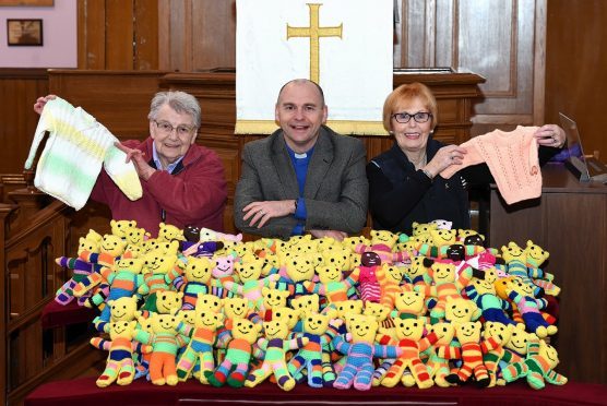 Church team members Elma Green, Rev Paul McKeown, and Elizabeth Mackenzie