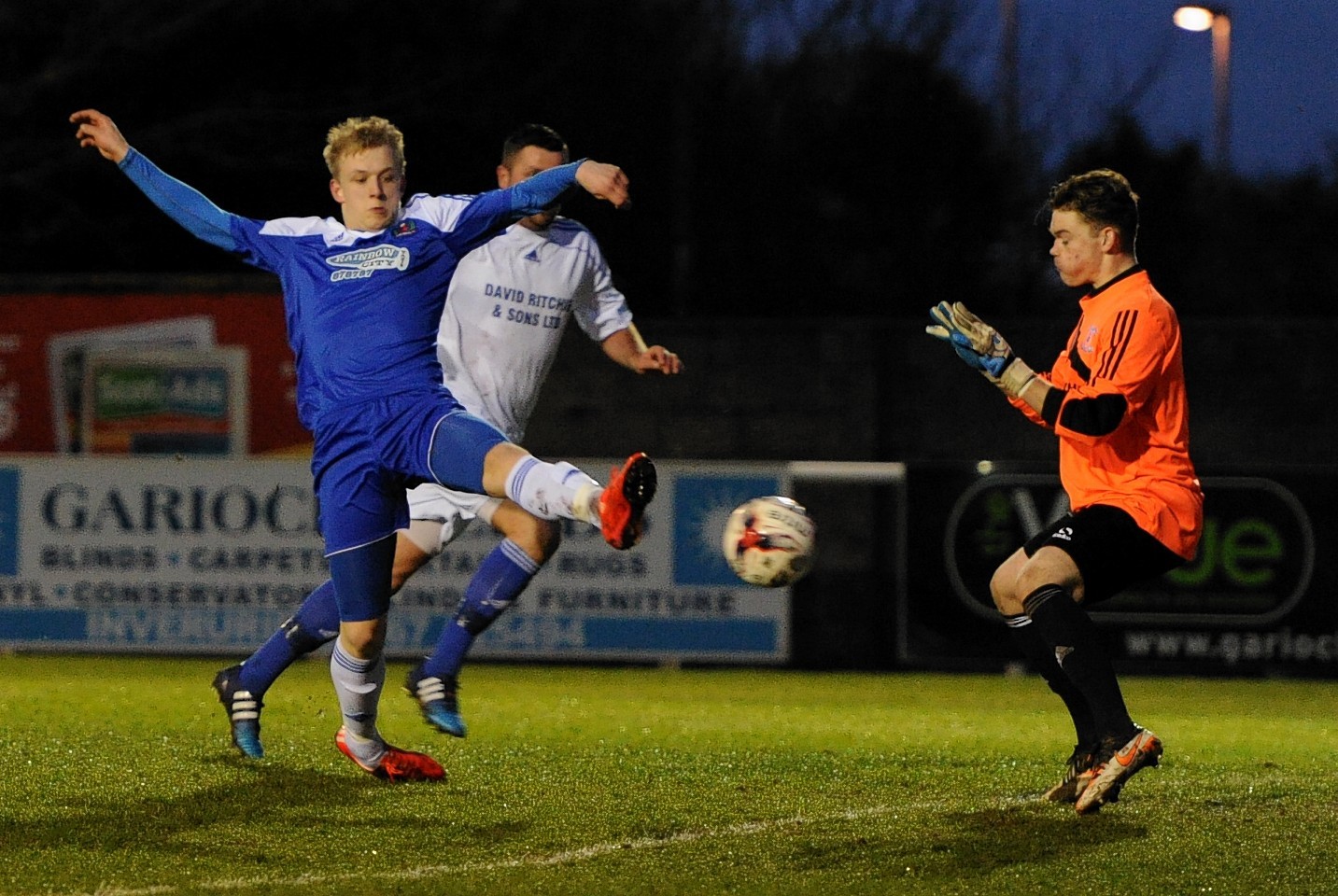 Harry Milne pokes home his first goal. Picture by Kenny Elrick