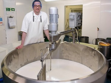 Rory Stone in the cheese factory