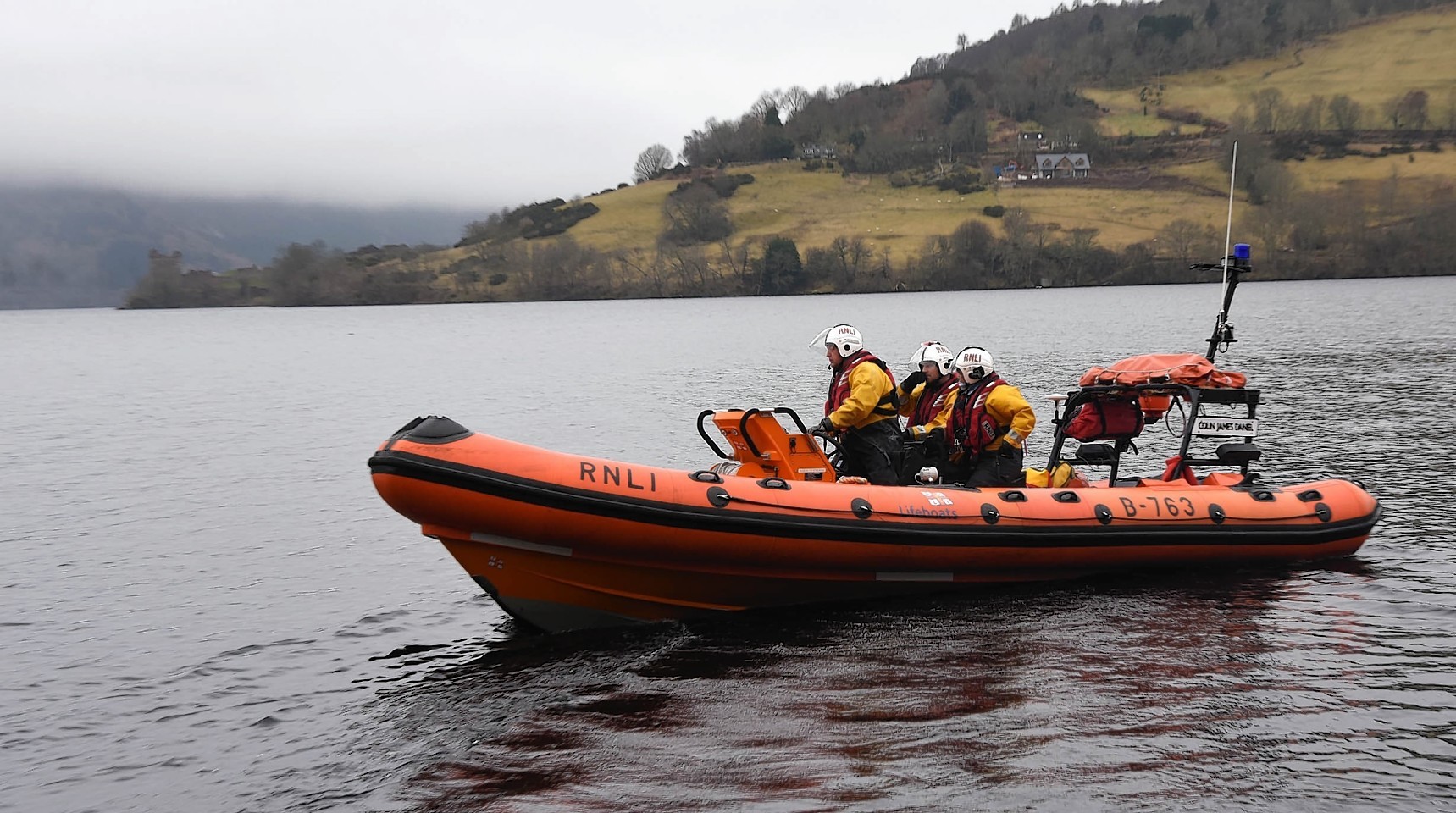 The Loch Ness RNLI boat conducts a search of Urquhart Bay.