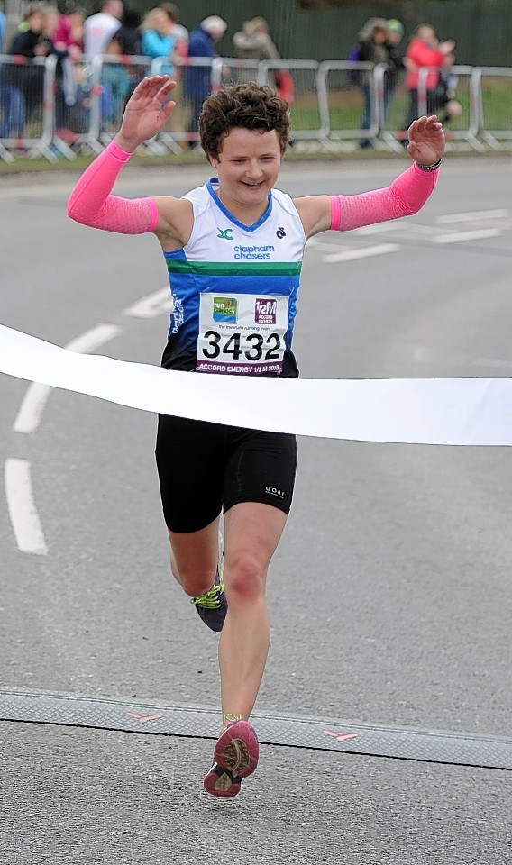 First woman in the Half Marathon Jennifer Elvin. Picture by Colin Rennie.