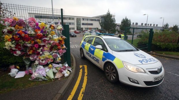 The scene outside Cults Academy in the days following the death of pupil Bailey Gwynne