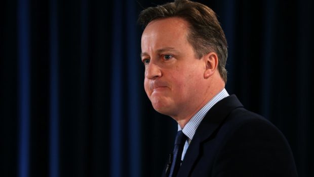 David Cameron was challenged at Prime Minister's Questions about whether he would quit in the event of an "out" vote