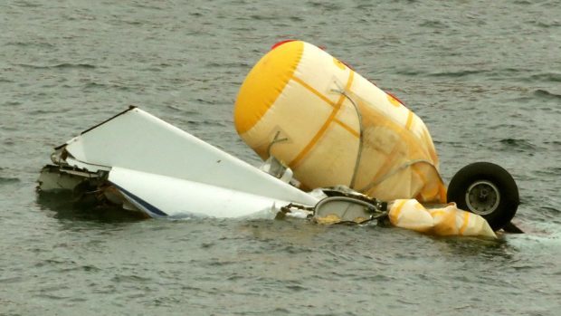 The wreckage of the Super Puma L2 helicopter which went down in the North Sea with the loss of four lives floats on the surface