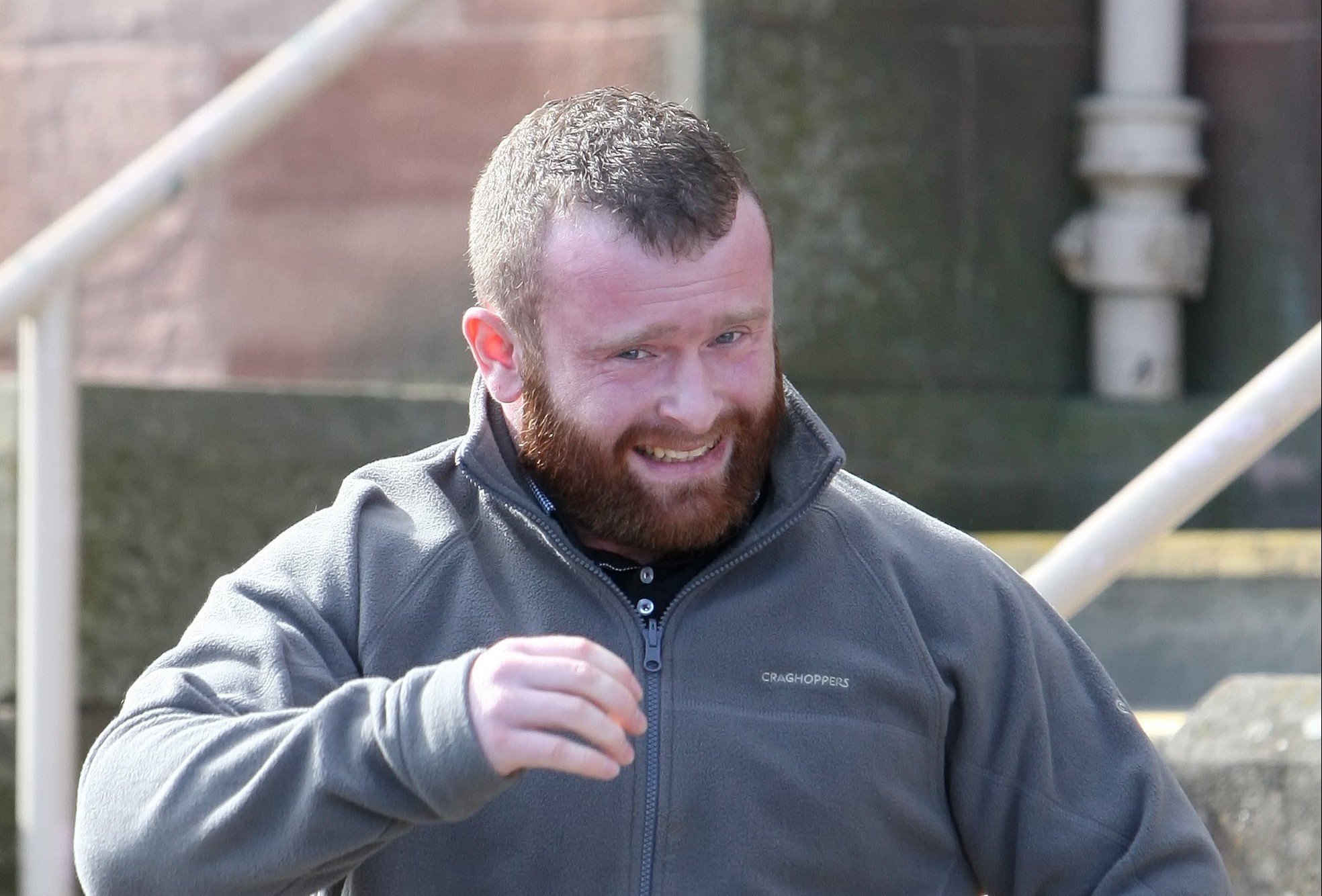 Liam Calder leaving Inverness Sheriff Court, where he appeared on a charge relating to the posting online of racially offensive material.