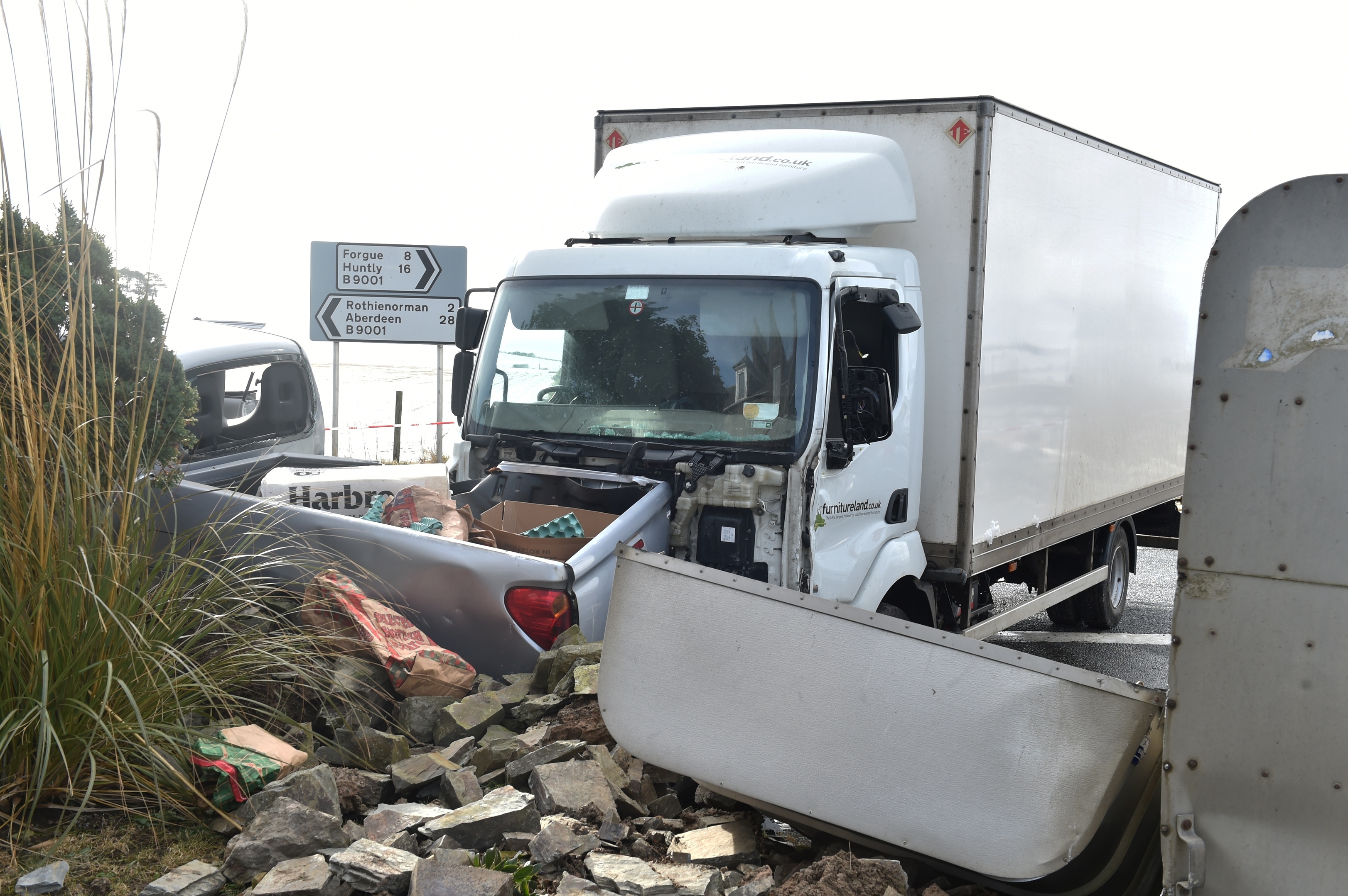 A lorry and pickup in an accident two miles from Rothienorman. PS John Simpson, who lives in the house (who didnt want photographed) which was damaged said that this is an accident blackspot. he is sending in pics and happy to speak to reporter. Picture by COLIN RENNIE March 3, 2016.