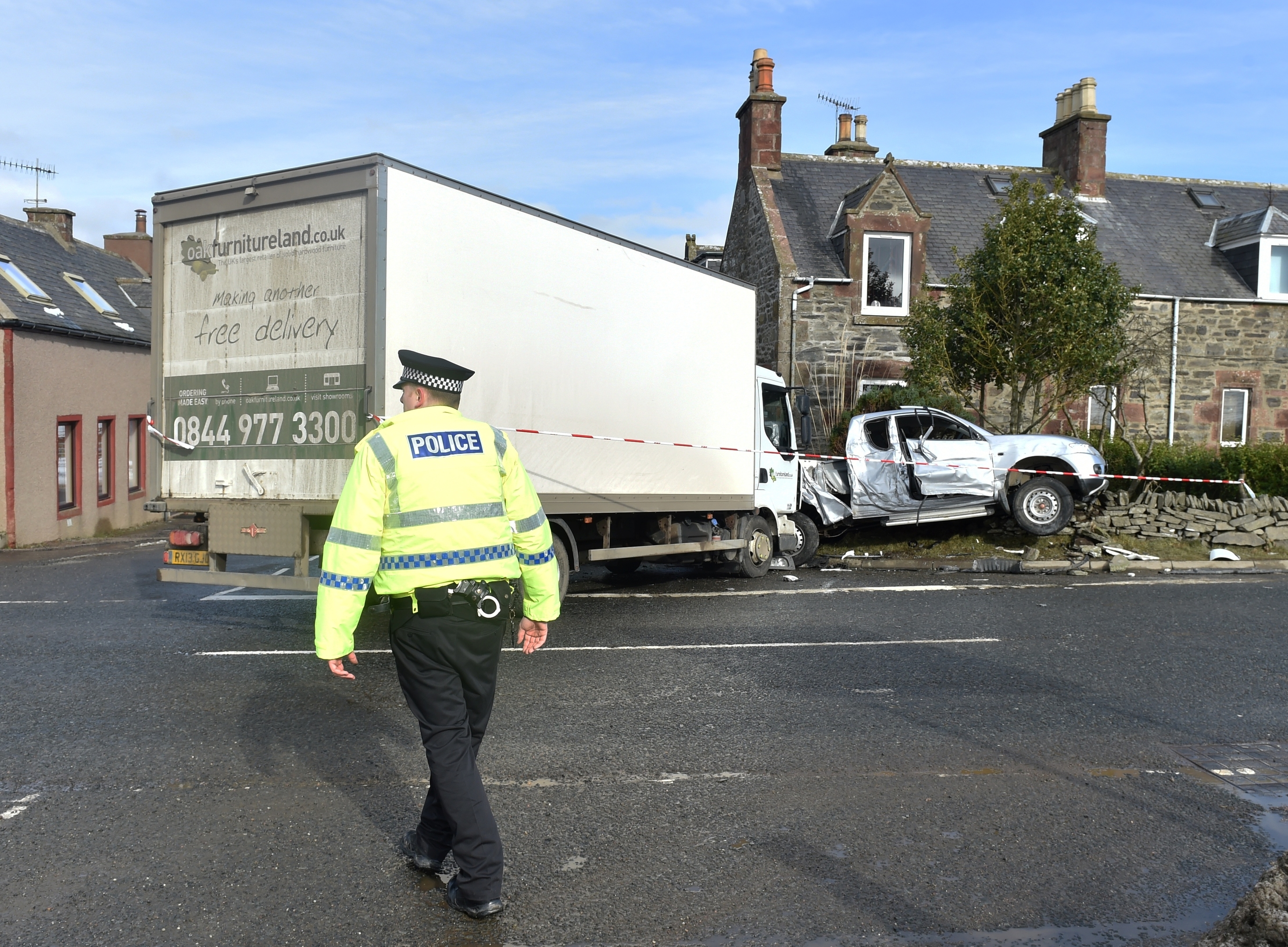 A lorry and pickup in an accident two miles from Rothienorman. PS John Simpson, who lives in the house (who didnt want photographed) which was damaged said that this is an accident blackspot. he is sending in pics and happy to speak to reporter. Picture by COLIN RENNIE March 3, 2016.