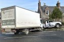 The lorry and the 4x4 crashed into a stone wall pictures by Colin Rennie