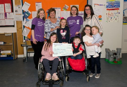 Back Row L-R: Wendy Blair, Lynne Holburn, Caitlin Forman, Clare Cogan Turner, Emma Bruce. Front Row L-R: Lucy Turnbull, Baxter Dick, Demi Ritchie holding baby brother James Ritchie. Picture: Mark Leman