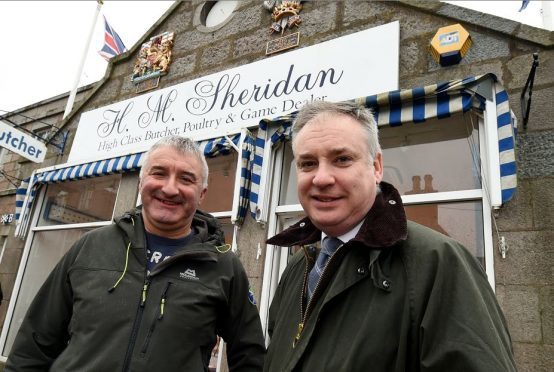 John Sinclair, of Sheridan butchers, Ballater, with Richard Lochhead yesterday.  Credit: Jim Irvine.