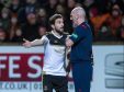 Aberdeen's Graeme Shinnie (left) appeals to referee Bobby Madden after being booked