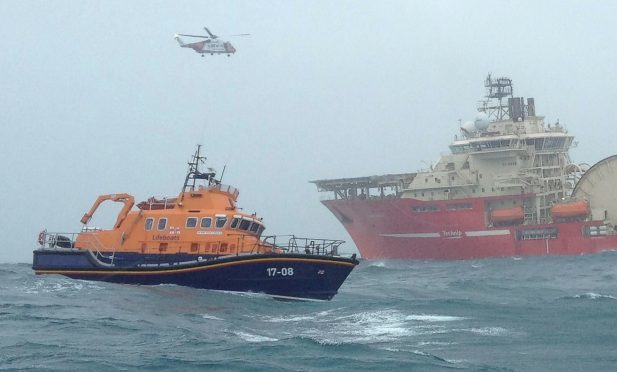 RNLI lifeboat from Barra tries to rescue the man on a 40ft boat that hit rocks near Skerryvore lighthouse.