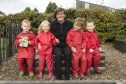Youngsters Charlie More, Emily Taylor, Campbell Stephen and Nikita Volovik with junior manager Stephanie Reidford at Clockwork Nursery