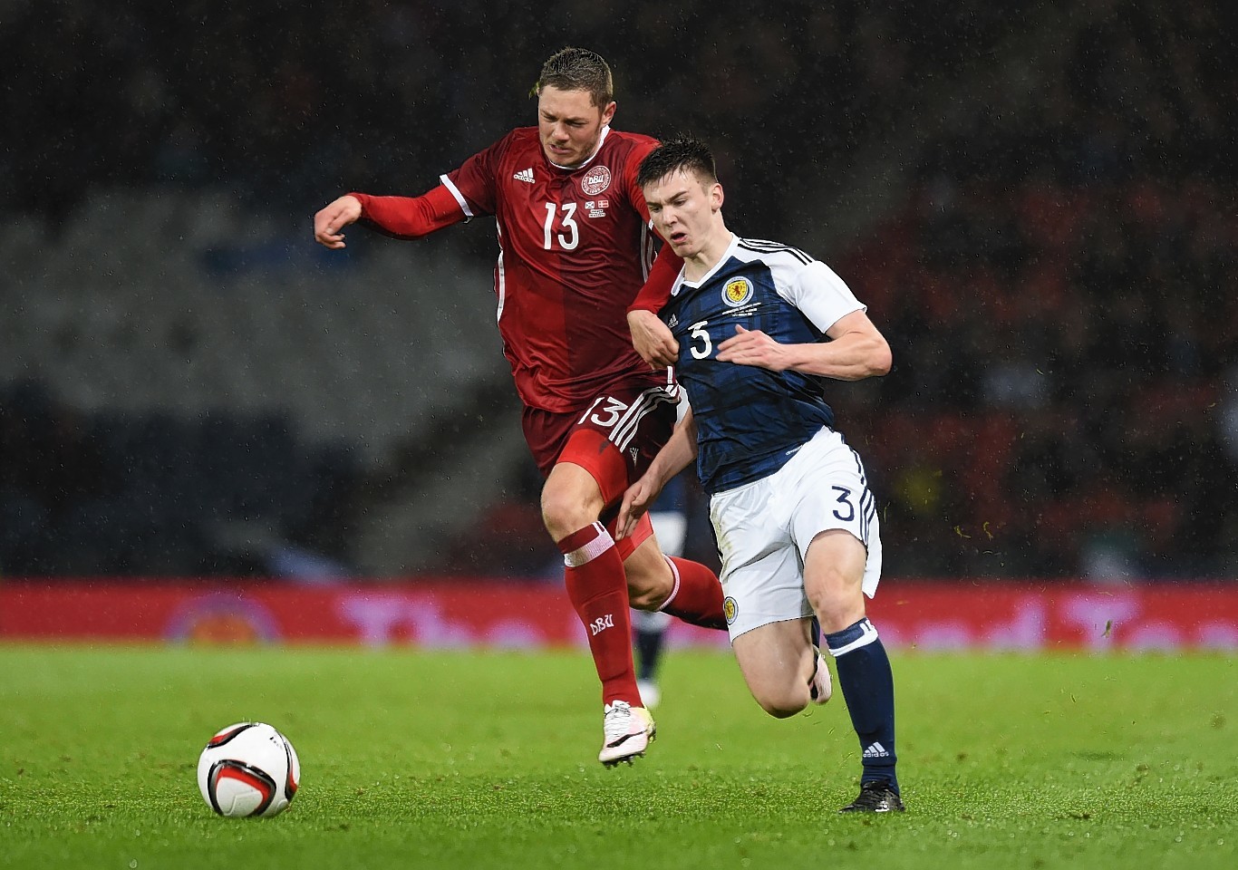 Tierney (right) is challenged by Henrik Dalsgaard