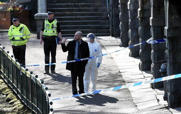 Police investigating the scene of the sex attack in Union Terrace Gardens last year.