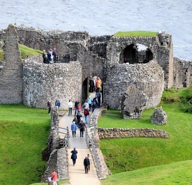 Tourists visiting Urquhart Castle