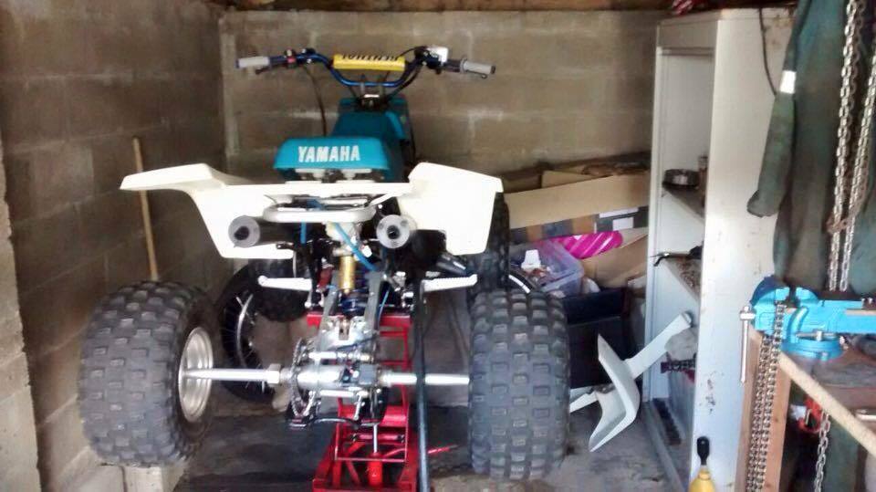 One of the quad bikes is described as being white and teal