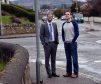 Councillors Gary Coull, left, and Douglas Ross, right, in Wittet Drive, Elgin after the council vote
