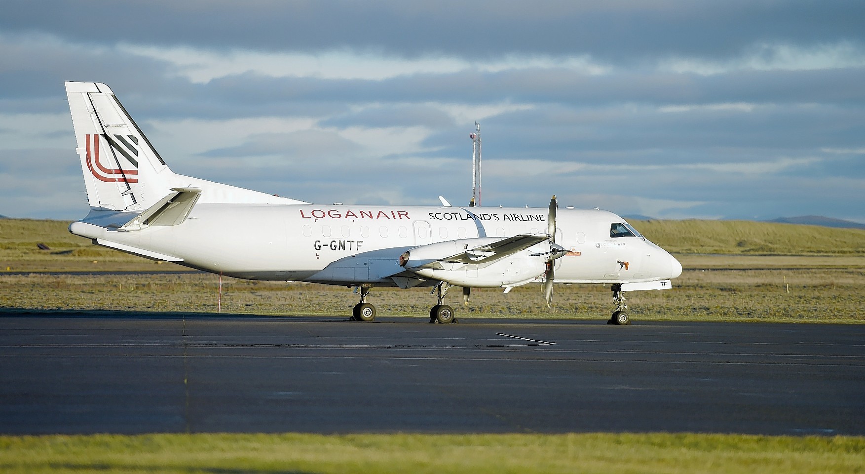 Loganair plane landing at Sumburgh Airport