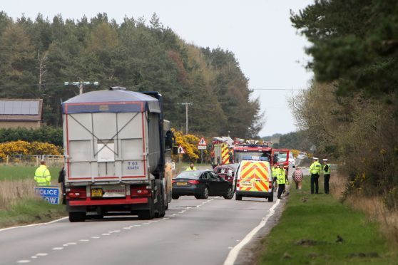 Scene of a two-vehicle RTC on the A96 near Delnies Woods. The vehicles involved were a grey Honda Jazz and a red Citroen Picasso C3. Picture: Andrew Smith
