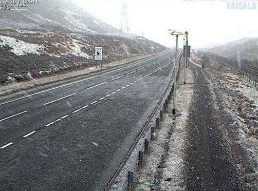 Snow falling on the A9 in April