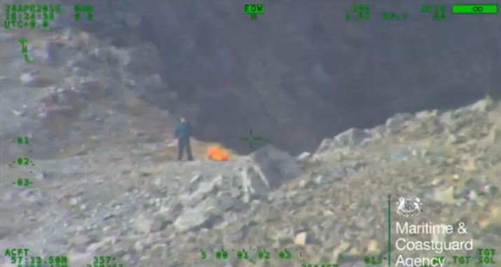 Footage taken from on board the helicopter as it approaches the peak