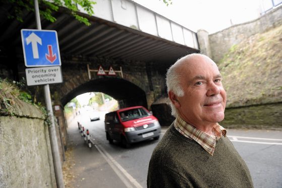 One of Nairn's community leaders, Dick Youngson, at one of the town's traffic pinch-points.