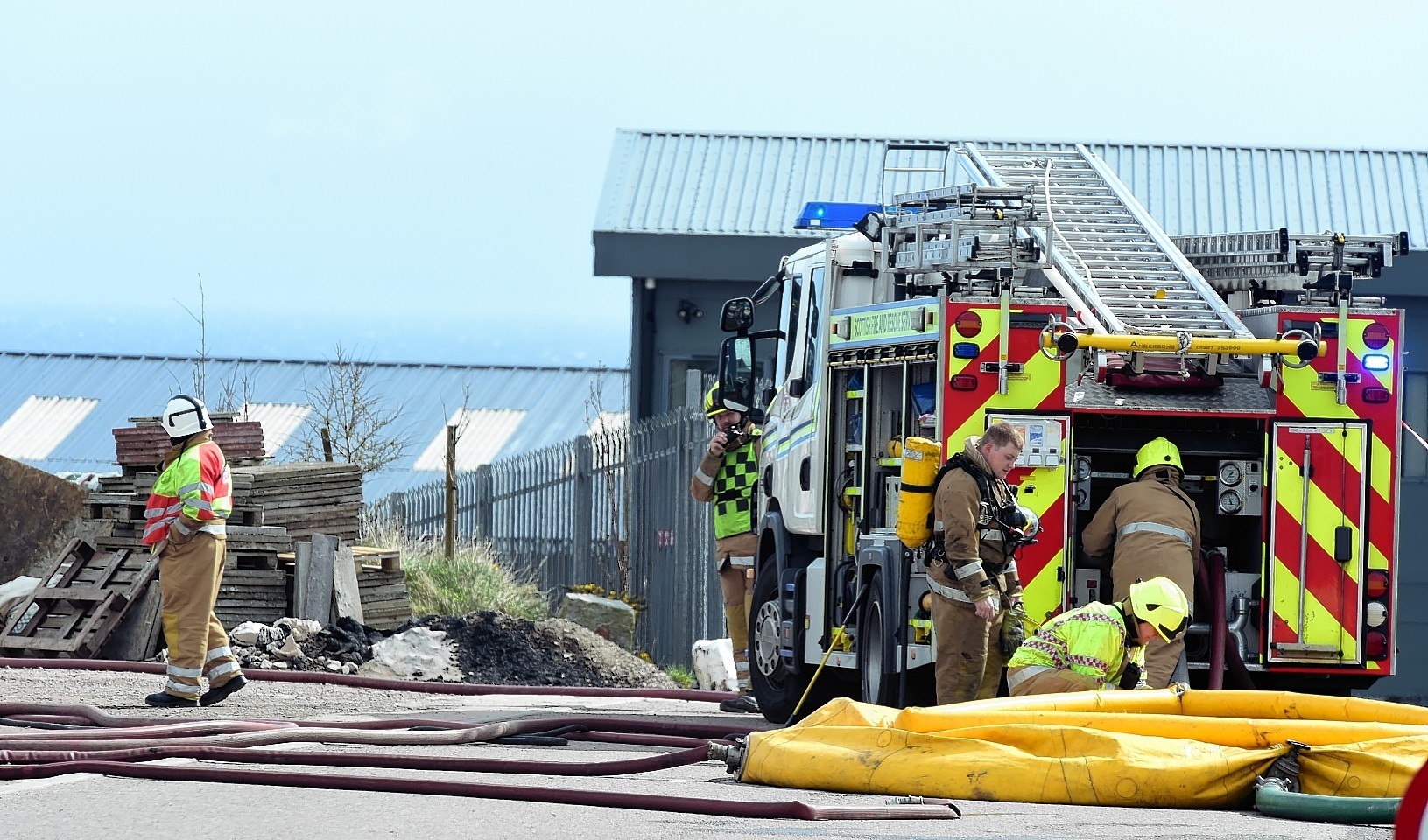 Fire crews attend the blaze at a unit in Blackhill Industrial Estate. Picture by Kami Thomson
