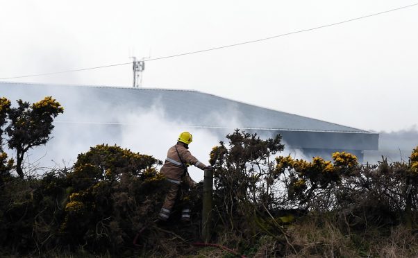 Fire crews attend the blaze at a unit in Blackhill Industrial Estate. Picture by Kami Thomson