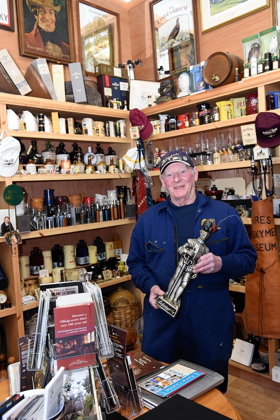 John Mackintosh with some of the memorabilia which forms his Whisky Museum in Forres.
Picture by Gordon Lennox