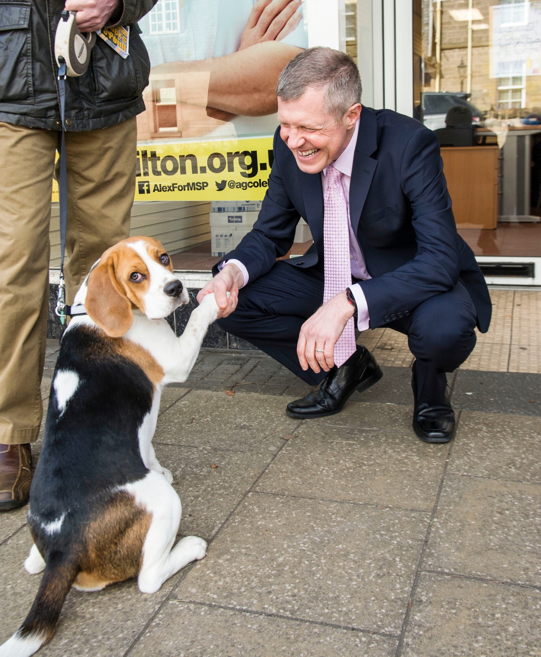 Pictured: Willie Rennie makes friends with Alfie Beagle Liberal Democrat leader Willie Rennie was in campaign mode when in Edinburgh Western ahead of the second TV leaders' debate. Mr Rennie joined volunteers at a street stand outside the local campaign office in Corstorphine with local candidate Alex Cole-Hamilton. Ger Harley | EEm 29 March 2016