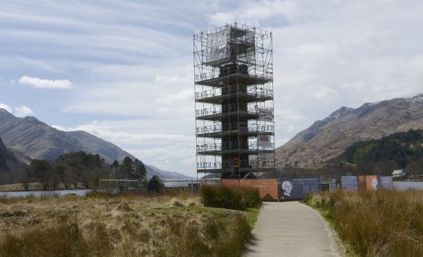 The historic Glenfinnan Monument shrouded in scaffolding during its refurbishment