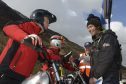 PRE 65 TRIALS 29/4/16 TV presenter,  TT Motorcyclist and Multi word speed records holder, Guy Martin shares a few words with Pre-65’s competitor, Tim Blackmore at the start of the event. PICTURE IAIN FERGUSON, THE WRITE IMAGE