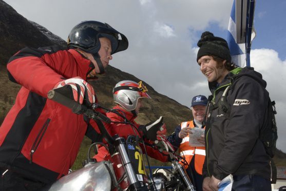 PRE 65 TRIALS 29/4/16 TV presenter,  TT Motorcyclist and Multi word speed records holder, Guy Martin shares a few words with Pre-65’s competitor, Tim Blackmore at the start of the event. PICTURE IAIN FERGUSON, THE WRITE IMAGE