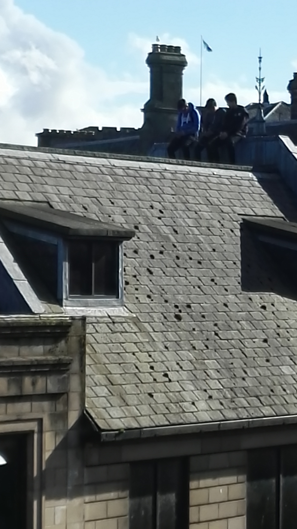 Children playing on rooftops in Inverness city centre