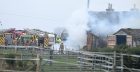 Firefighters at the scene of the blaze at a farm near Invergordon