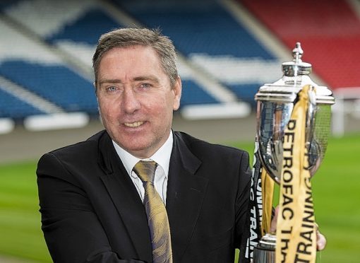 Peterhead boss Jim McInally with the Challenge Cup trophy