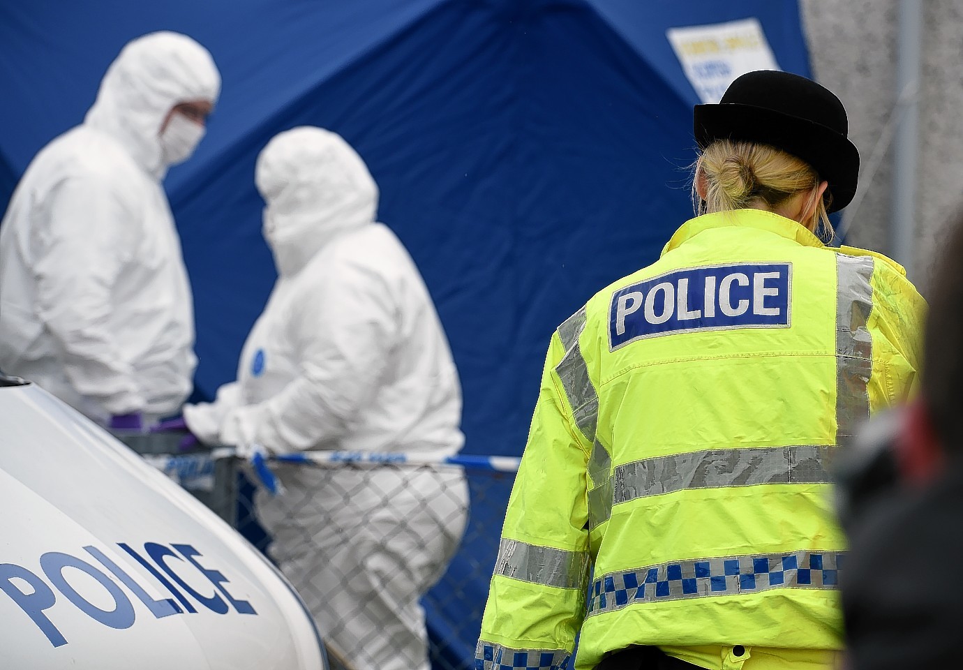 Police and forensic experts at Kintail Court in Inverness. 