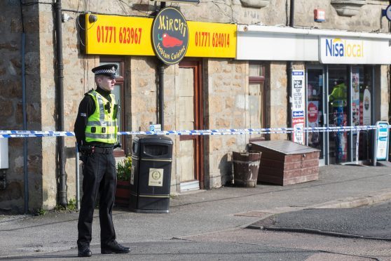 Police at the scene in Mintlaw following the death