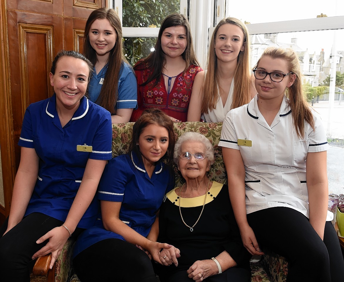 Nan Milton, celebrating her 100th birthday with family, friends and staff at Ashley House care home. Picture by Jim Irvine 