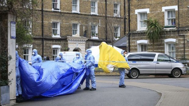 Forensic officers at the estate where the remains of PC Gordon Semple were found