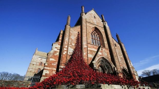 The Weeping Window sculpture made of ceramic poppies at St Magnus Cathedral in Orkney, Scotland