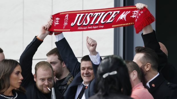 Relatives of the victims who died in the Hillsborough disaster outside the inquest in Warrington