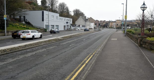 The injured man was found near Morrison's supermarket on Millburn Road