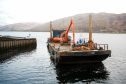 Work is under way on installing floating pontoons by the West End Car Park in Fort William