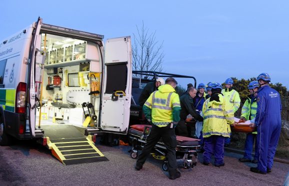 Emergency services rescue a man who broke a limb on the beach at Aberdeen, north of the mouth of the river Don.    
Picture by Kami Thomson    03-04-16