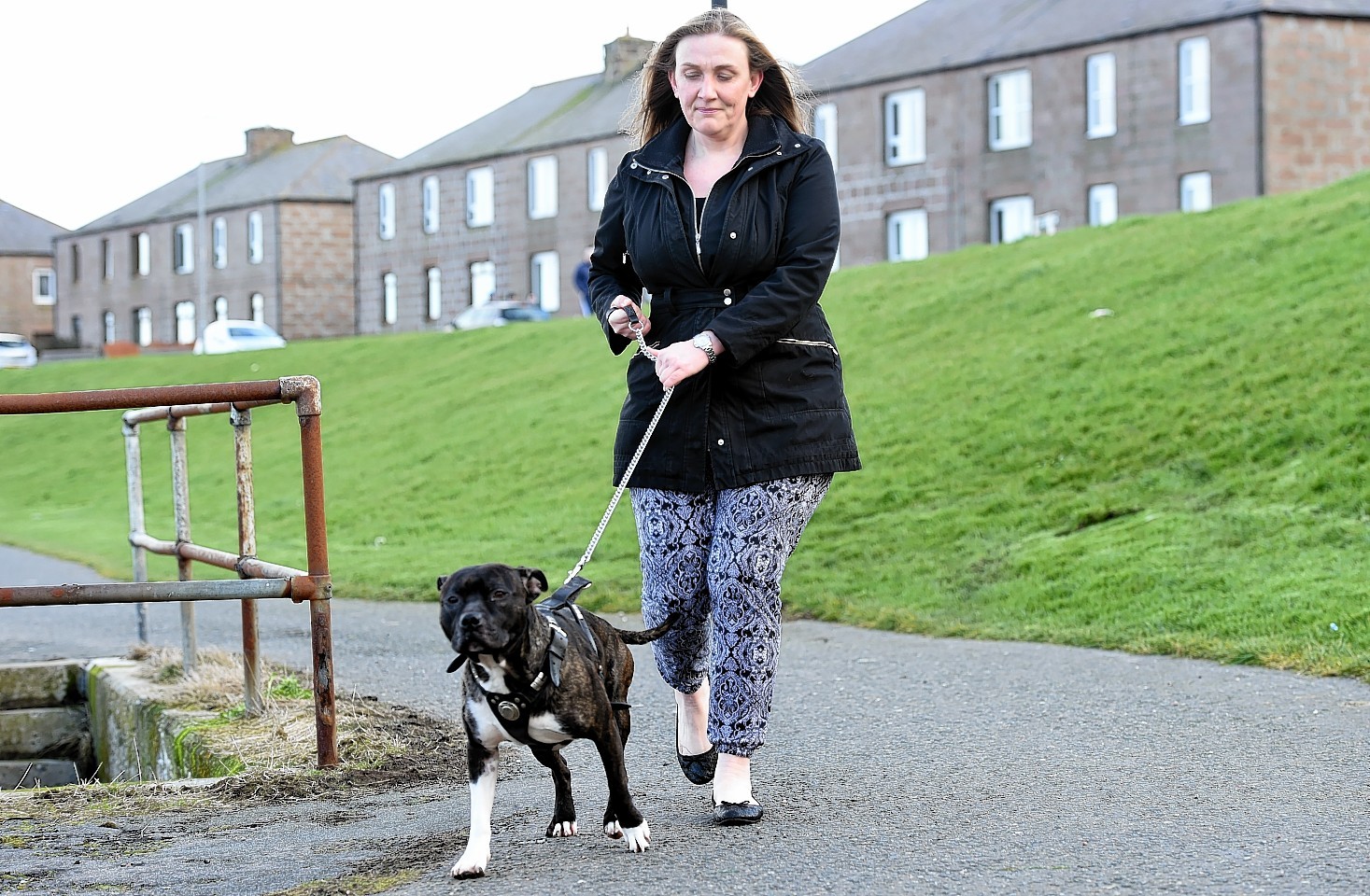 Sarah O'Neill with her staffie Fatboy. Picture by Kami Thomson